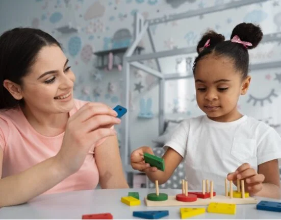 Special educator teaching a child